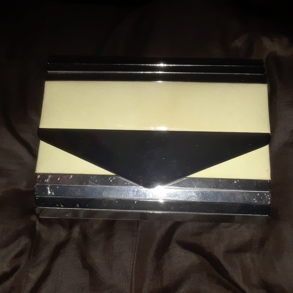 Leather and metal clutch